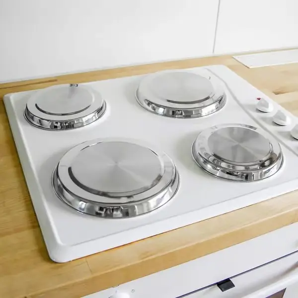 Sett med 4 kokeplatebeskyttere i rustfritt stål for komfyr.